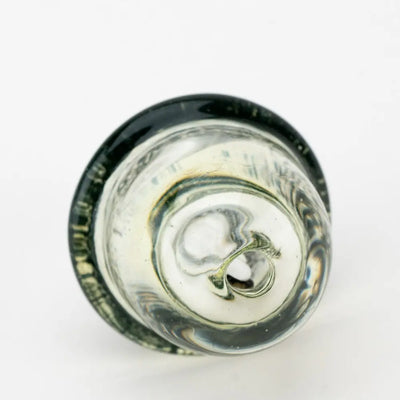 Translucent Empire Glassworks spinner cap carb cap with swirling black and white glass patterns