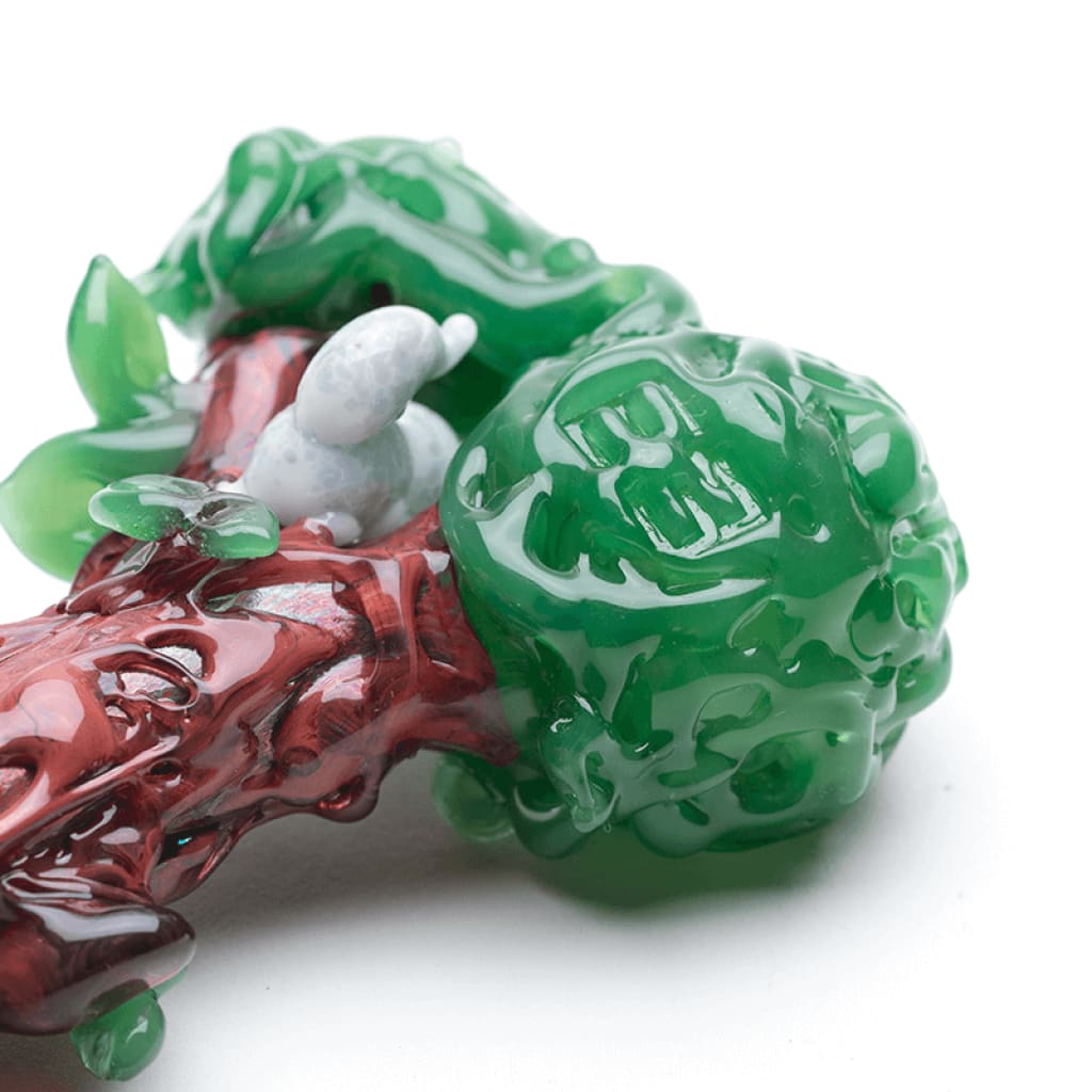 Empire Glassworks’ meticulously hand-blown glass strawberry sculpture tree hand pipe