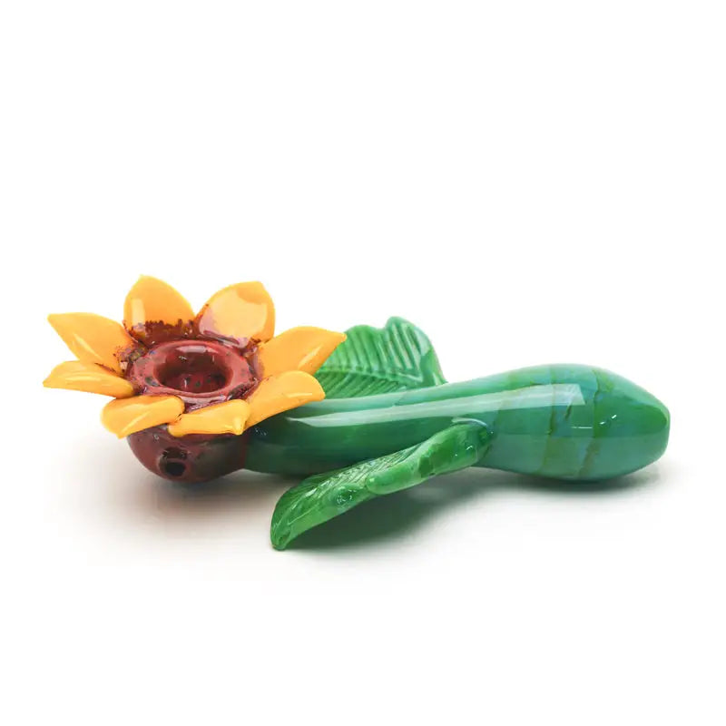 Empire Glassworks sunflower glass hand pipe with vibrant yellow and green petals