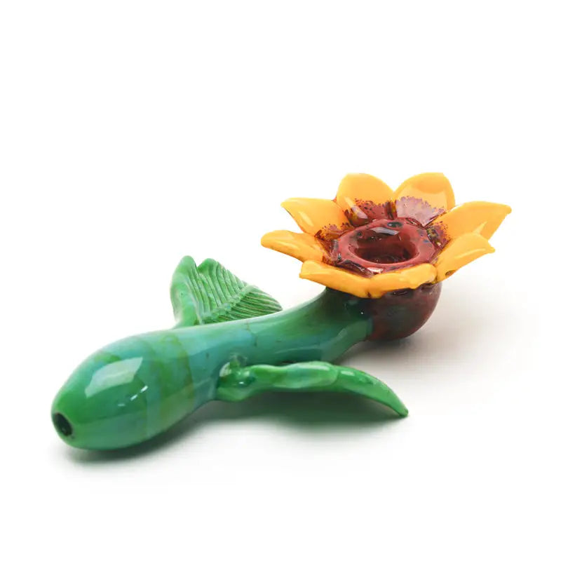 Empire Glassworks sunflower glass hand pipe with vibrant yellow and green petals