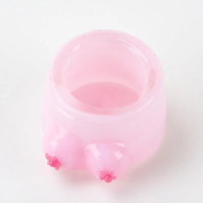 Pink translucent Empire Glassworks terp jar with boobies protrusions