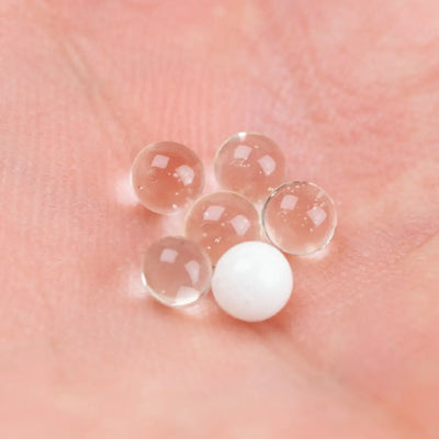 Empire glassworks terp pearls 4mm uv pearls on pink surface