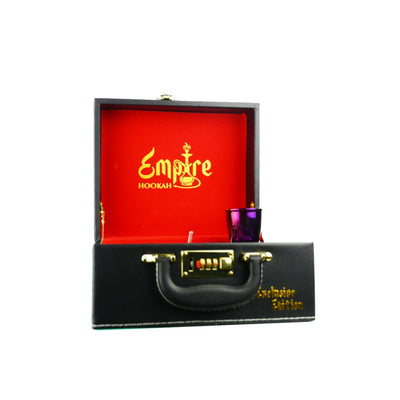 Open black briefcase with red interior, Empire Hookah Peafowl, containing a purple container