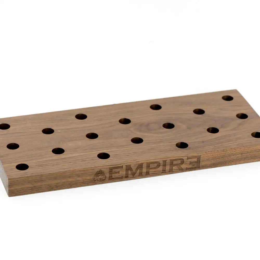 Empire wooden bowl piece display with holes and logo