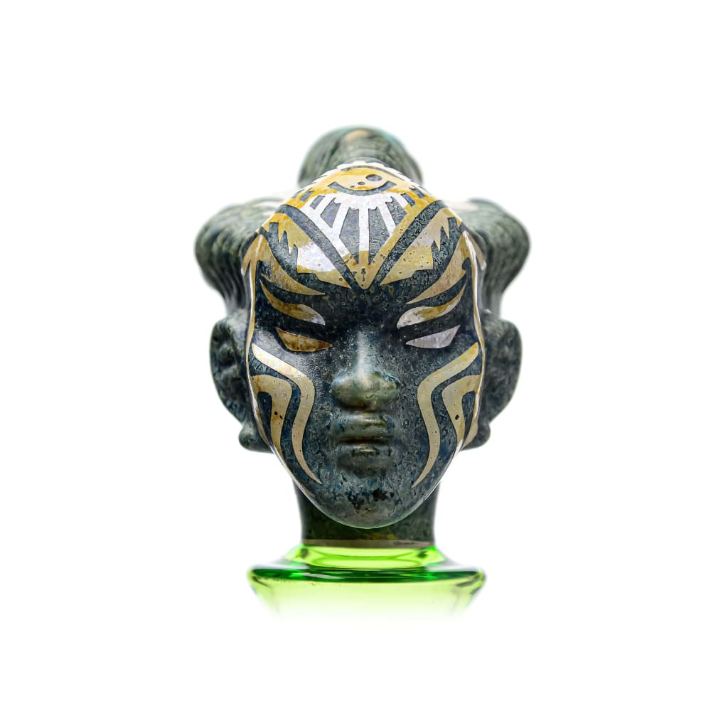 Ornate stone ceramic head on green base - Thick Glass Etch Dab Rig With Slitted Cut Perc
