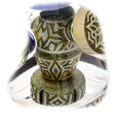 Glass bead with etched green stone insert on Etch Dab Rig V2 with Slitted Cut Perc