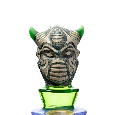 Ornate bottle stopper with green-horned tribal mask for Etch Dab Rig V2 with Slitted Cut Perc