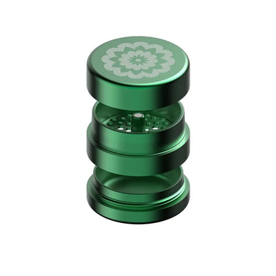 Green metal herb grinder from Flower Mill’s Generation Standard for glass hand pipes