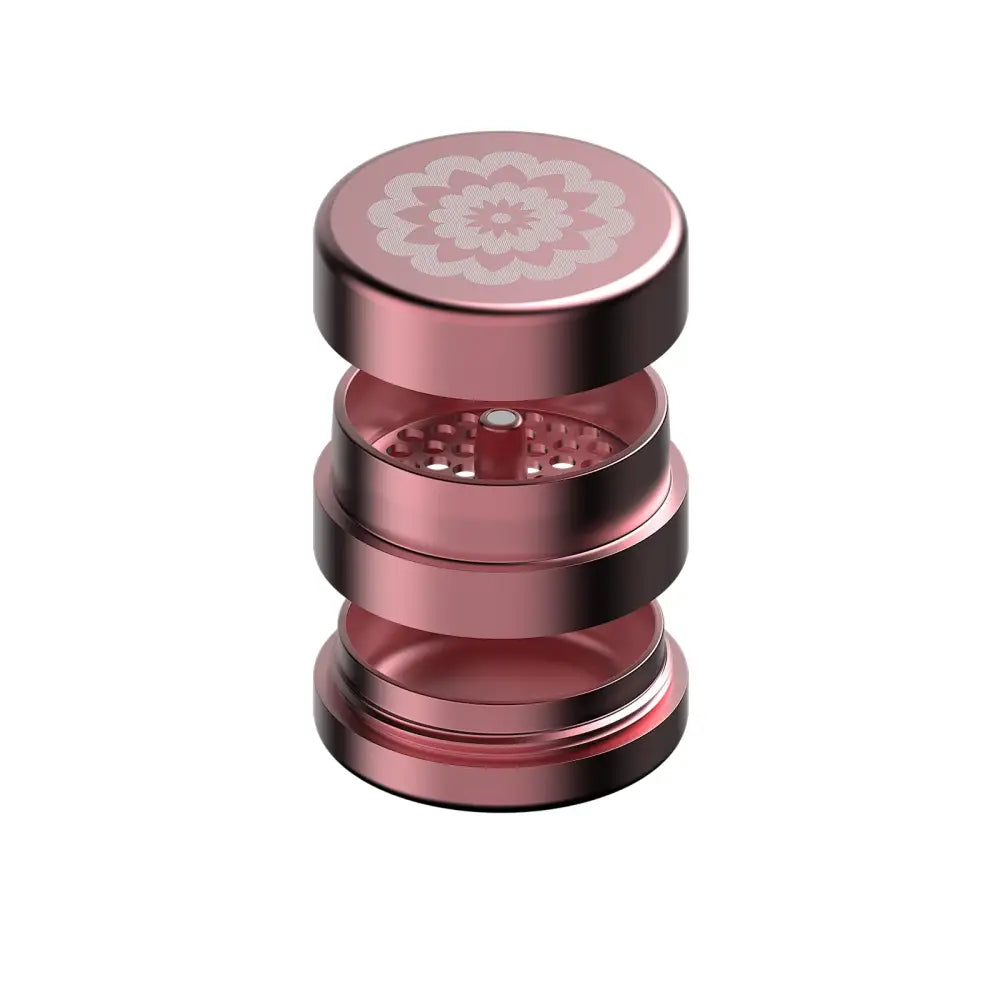 Rose gold metal grinder compatible with Flower Mill’s Generation Standard rolling paper