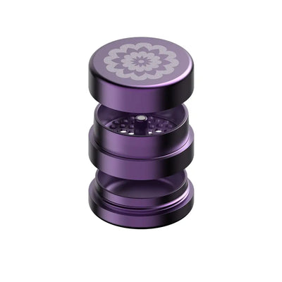 Purple metal herb grinder with Flower Mill’s Generation Standard rolling paper design