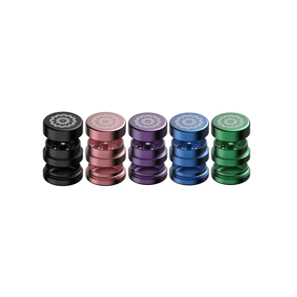 Colorful metal herb grinders with Flower Mill’s Generation Standard rolling paper design