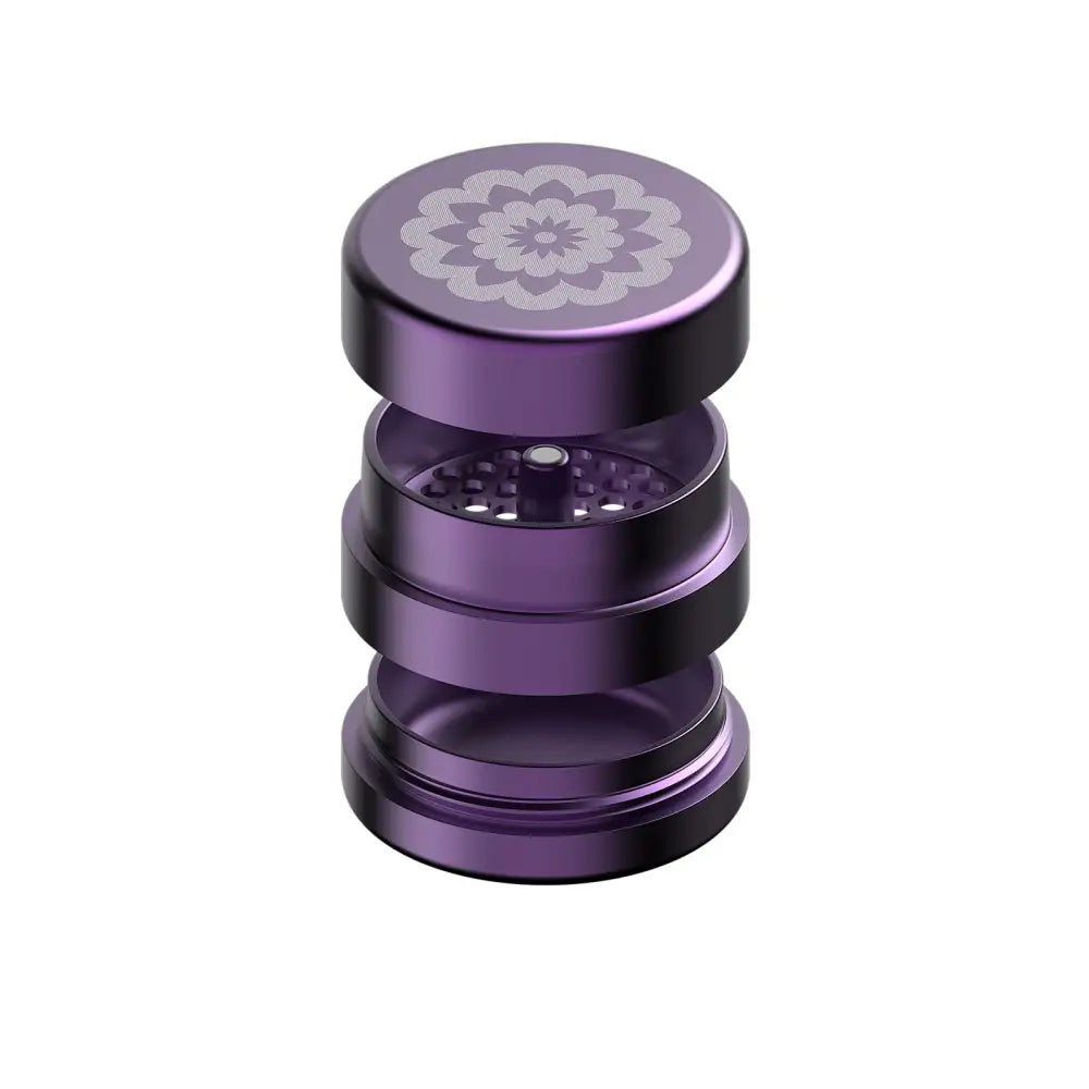 Purple metal herb grinder from Flower Mill’s Generation Standard for glass hand pipes