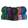 Colorful metal herb grinders featuring Flower Mill’s Generation Standard design for glass water pipes