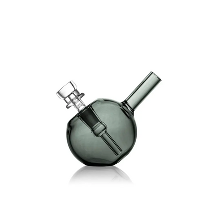 Gray glass water pipe from Grav Spherical Pocket Bubbler, compact design for easy use