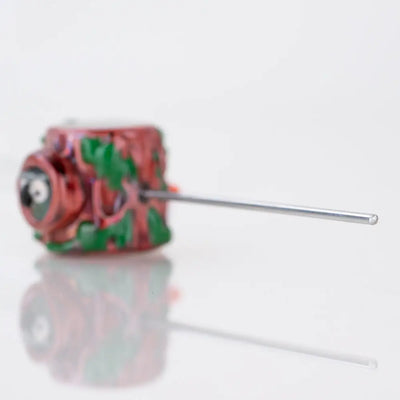 Hooties Forest poker wand by Empire Glassworks: red and green intricately carved camera-shaped bead with metallic needle