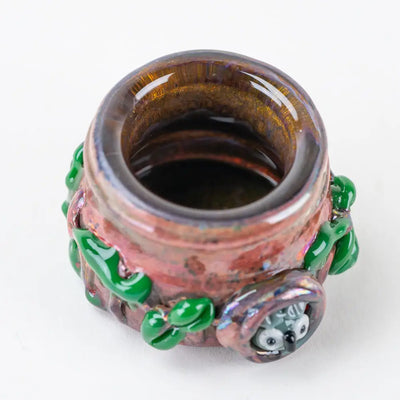 Hooties Forest Terp Jar by Empire Glassworks: glossy iridescent ceramic with green leaves