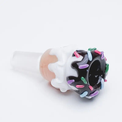 Ice cream cone bowl piece with black icing, frosting drips, rainbow sprinkles