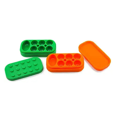 Lego-style silicone container in bright green orange for dabber’s dream