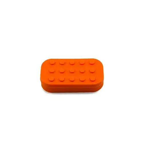 Bright orange Lego-style silicone container for dabber’s dream