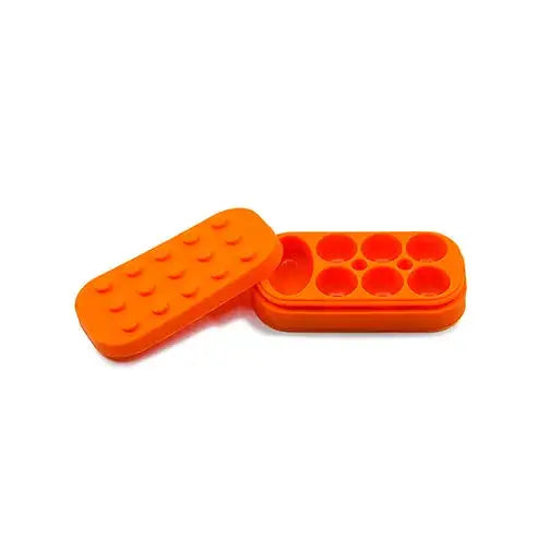 Bright orange Lego-style silicone container for dabber’s dream with lid