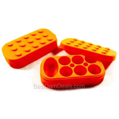 Orange Lego-style silicone container for dabbers dream egg tray