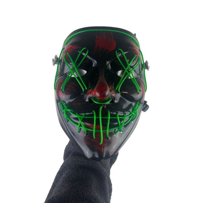 Eerie black plated gas mask bong with glowing green lines and silicone mask for Halloween
