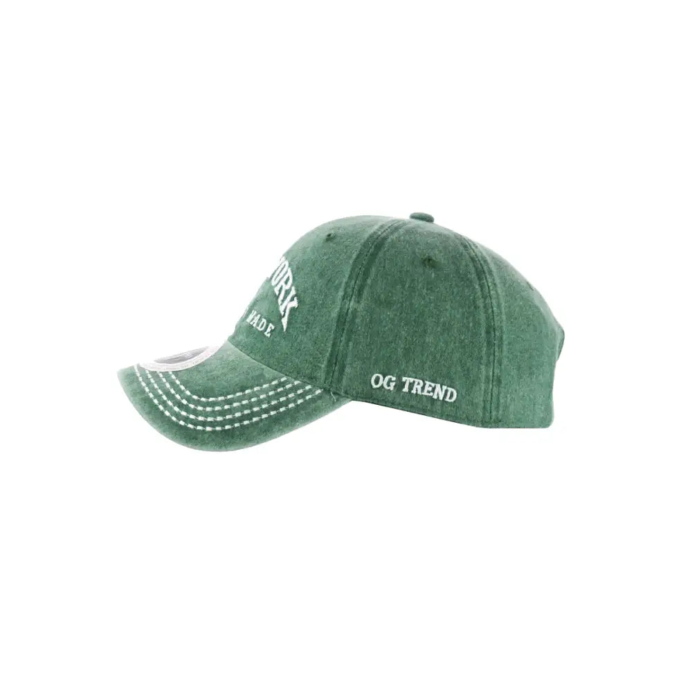 Green distressed baseball cap with white embroidery from New York Original Cotton Buckle Dad Hat