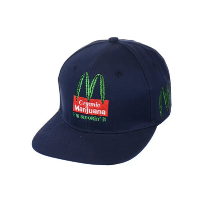 Navy blue organic leaf embroidered snapback hat with green and red marijuana parody logo