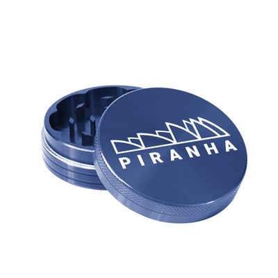Compact Piranha aluminum piece grinder for efficiently grinding dry herbs