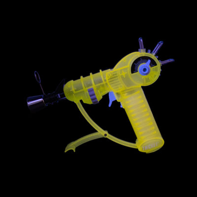 Yellow translucent toy ray gun with purple accents - Glow In The Dark Real Life Ray Gun Torch