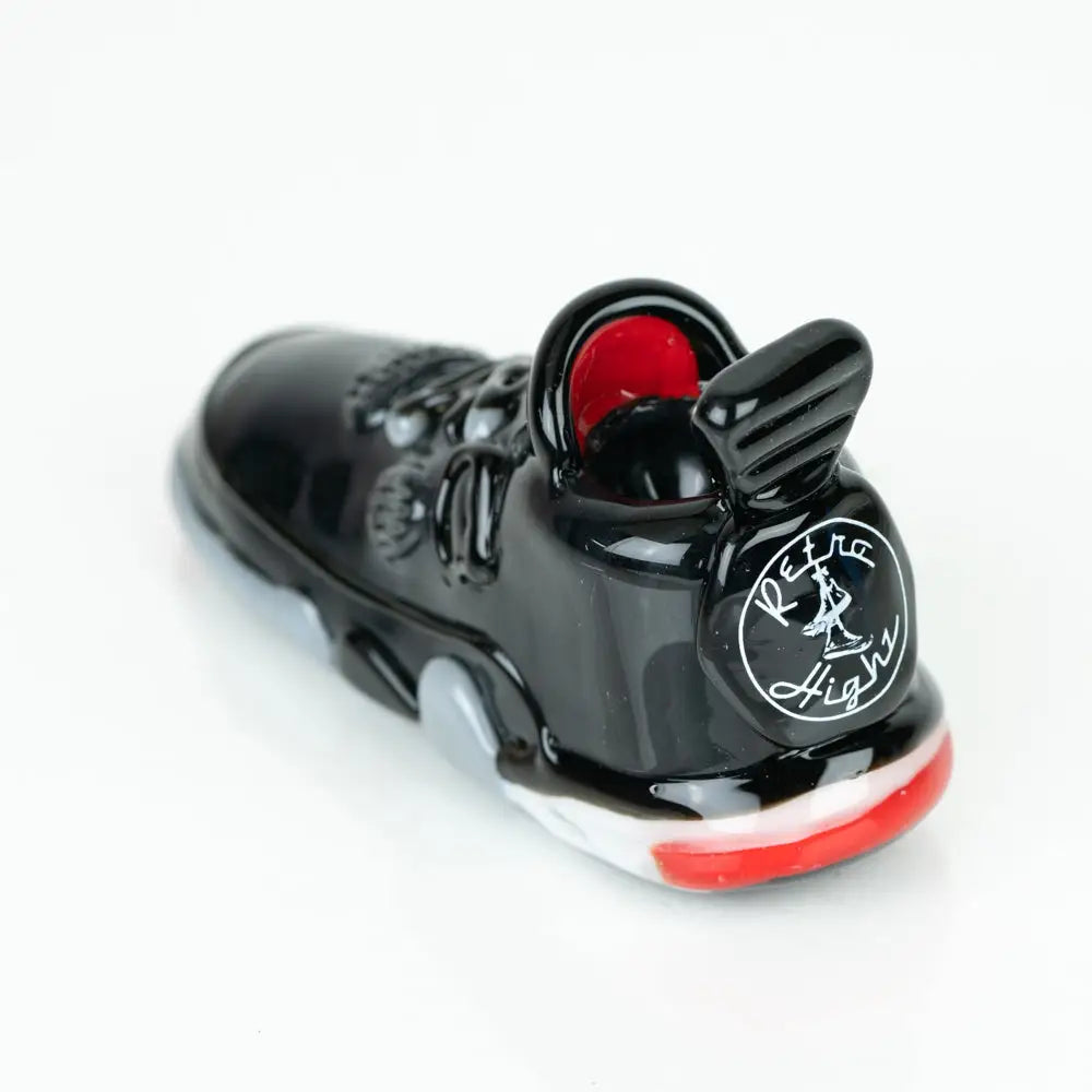 Retro Highz black glass hand pipe with red accents and retro high logo