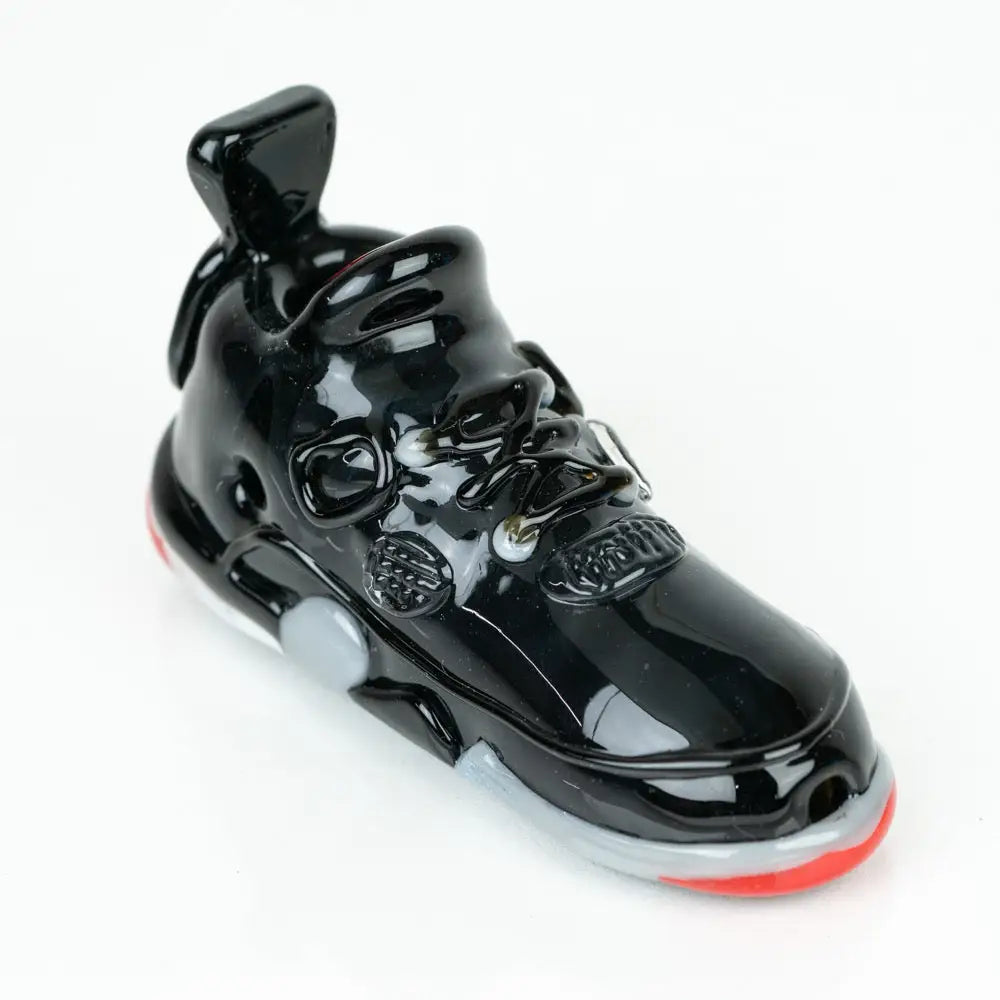 Shiny black sneaker figurine from Retro Highz V2 Black with glass hand pipe design