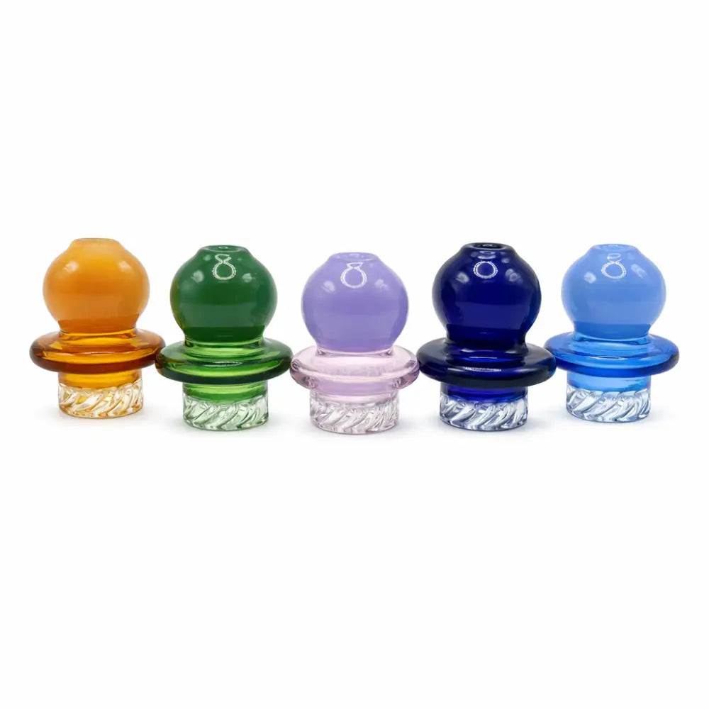 Five colorful Riptide Vortex Ball carb caps with rounded tops and textured bases
