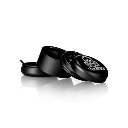 Black multi-part Ruckus Aluminum Grinder with Skull logo for Lion Rolling Circus hemp wraps