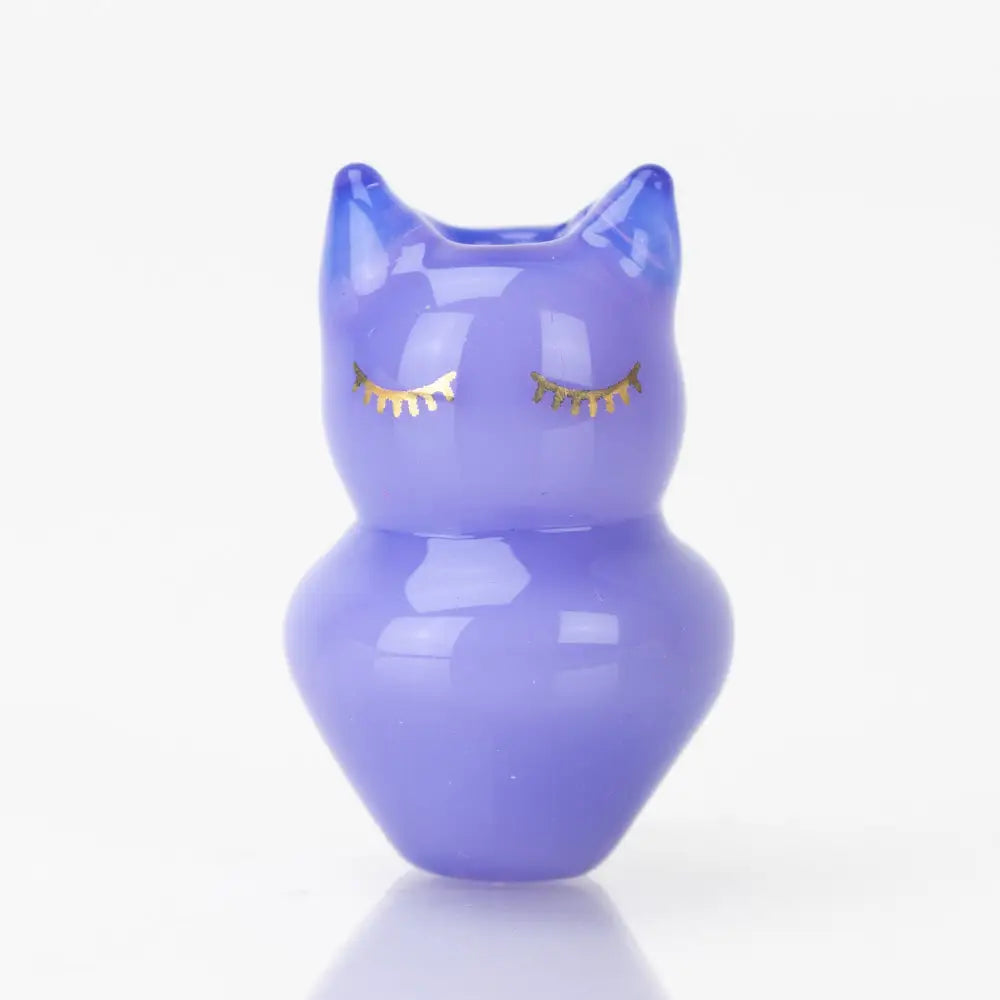 Glossy lavender Sakibomb Kitty Carb Cap owl figurine with gold eyes