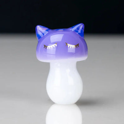Glossy purple sakibomb kitty head carb cap with blue ears and gold lashes