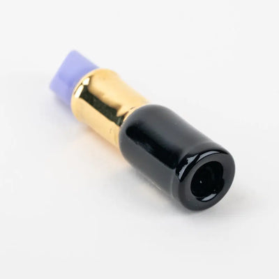 Sakibomb purple lipstick chillum with black glass adapter, gold band, purple silicone tip