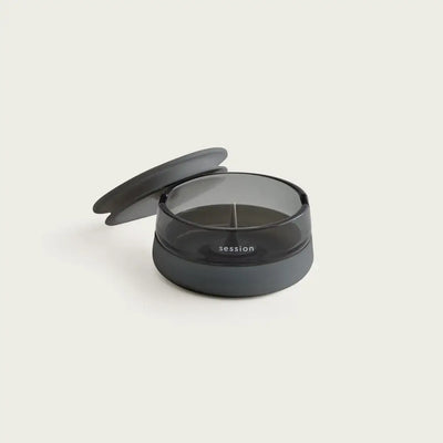 Session Goods ashtray: dark gray translucent plastic pill organizer with lid and divider