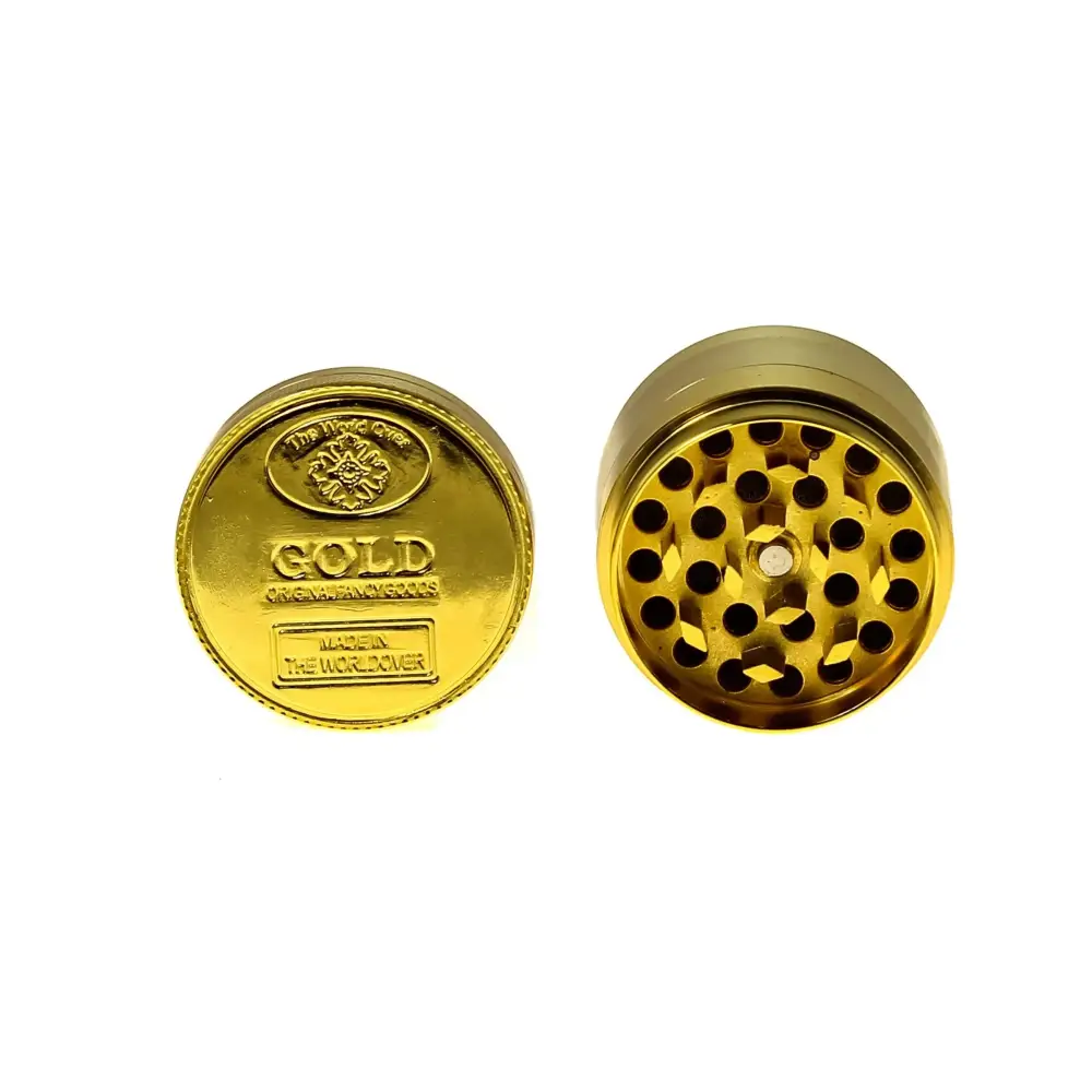 Shiny gold coin grinder with perforated chamber, premium herb grinder