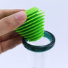 Bright green silicone cleaner plugs for glass water pipes, enhancing your smoking experience