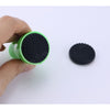 Silicone Magnetic Cleaner for Glass Water Pipes: Green device with textured black pad end