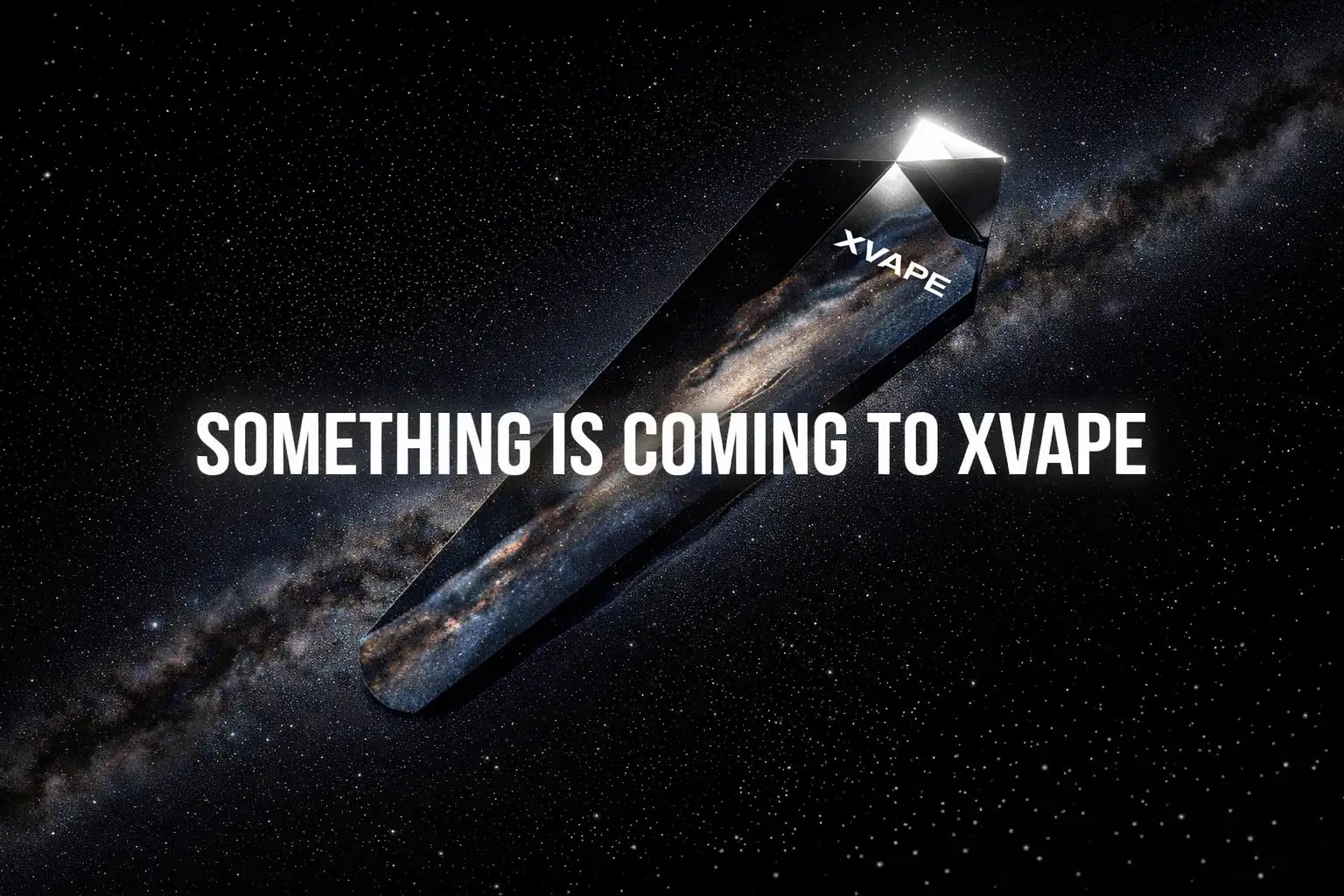 A sleek, black, transparent crystal-shaped object with a glowing white tip and the ’xvape’ logo etched on its surface.