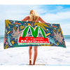 Cannabis-themed beach towel with parody logo for a fun seaside picnic personal statement