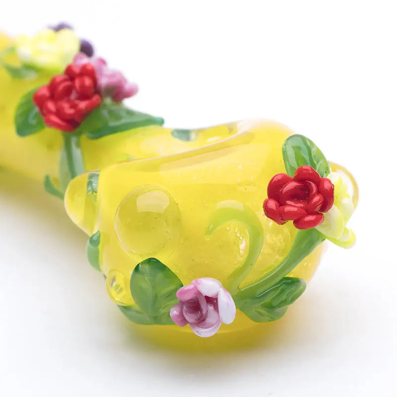 Sunshine Garden Design spoon pipe in durable borosilicate glass with yellow body and floral accents