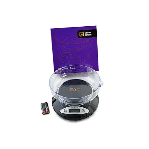 Teeter totter scales black digital scale with glass bowl and purple packaging
