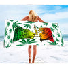 Tiger Guy Smoking Beach Towel with an eye-catching cannabis leaf pattern and stylized faces