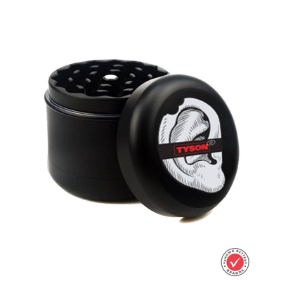 Black herb grinder with Tyson branding and bitten ear illustration on lid