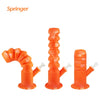 Three orange Waxmaid Springer collapsible silicone water pipes with spiral necks