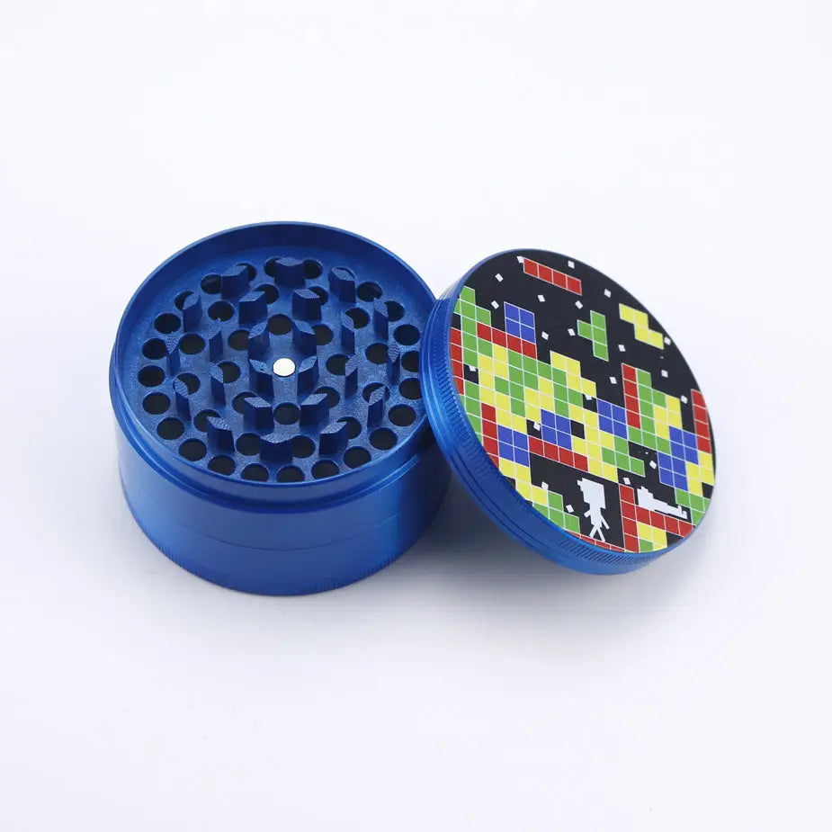 Blue zinc alloy herb grinder with tetris lid design