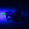 Empire Glassworks 14mm UV reactive unicorn bowl glowing under ultraviolet light